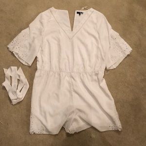Kaari blue romper in white